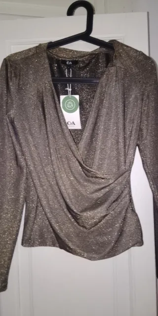 Blusa de noche dorada brillante C&A