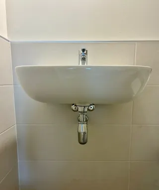 Lavabo de porcelana blanco