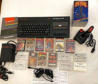 ZX Spectrum+2 + joystick en caja + 12 juegos de Segunda mano por