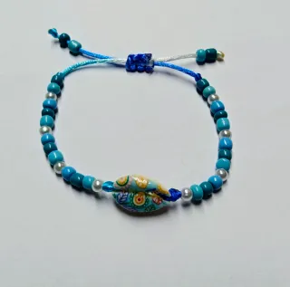 Pulsera ajustable con abalorios y concha