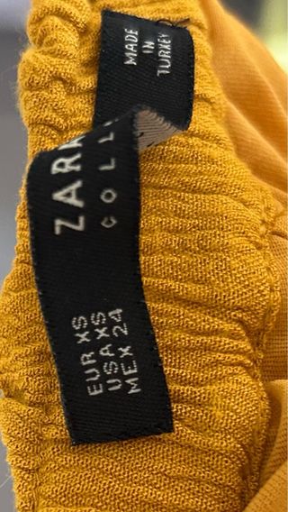 Falda larga color mostaza de Zara