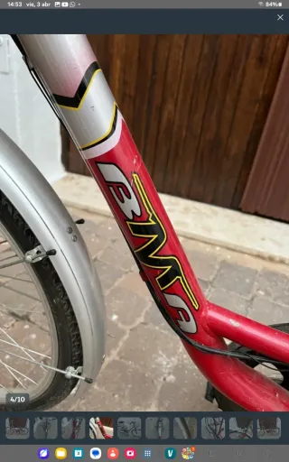 Bicicleta urbana roja y plateada SOLO RECOGIDA