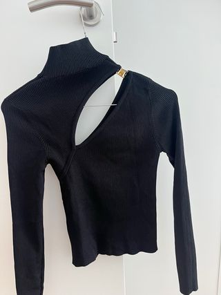 Jersey cuello alto con abertura