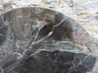 Tablero de mármol veteado redondo