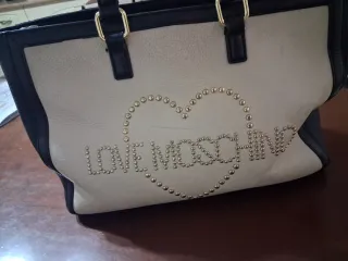 Borsa Love Moschino bianca e nera con borchie