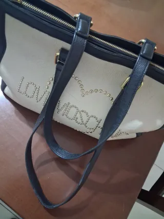 Borsa Love Moschino bianca e nera con borchie