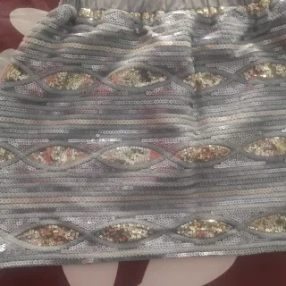 MINI FALDA DE LENTEJUELAS