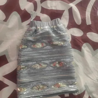 MINI FALDA DE LENTEJUELAS