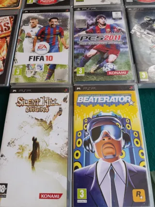 Lote 10 giochi PSP + console da riparare