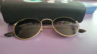 Gafas de sol Unofficials doradas y marrones