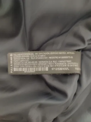 Chaqueta Pull&Bear azul, blanca y negra