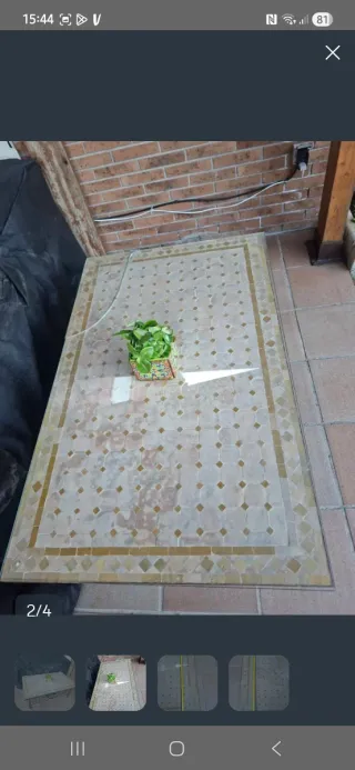 Tavolo basso in pietra e metallo