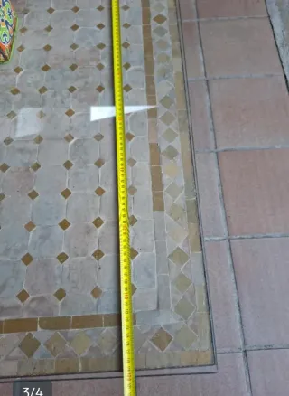 Tavolo basso in pietra e metallo