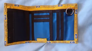 Monedero Rip Curl azul y amarillo
