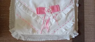 Juego de sábana y almohada cochecito/cuna.