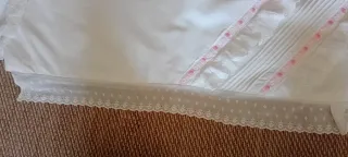 Juego de sábana y almohada cochecito/cuna.