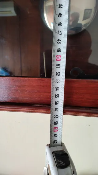 Reloj de péndulo antiguo de madera