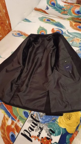Traje de chaqueta negro.