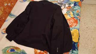 Traje de chaqueta negro.