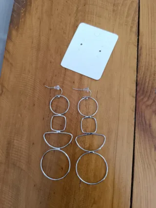 Pendientes largos diseño geométrico acero nuevos