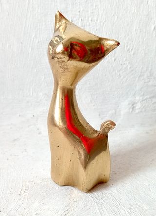 Gato de latão