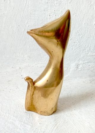 Gato de latão