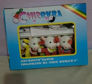 Juguete de cuna con vacas