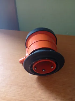 Cabezal de botano naranja y negro