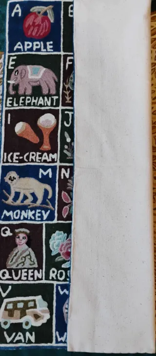 Alfombra bordada a mano abecedario