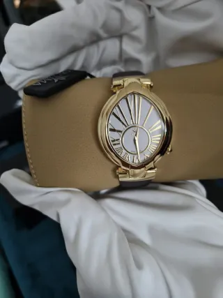 Reloj de oro y blanco