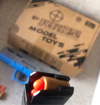 Chaleco táctico negro + funda pistola