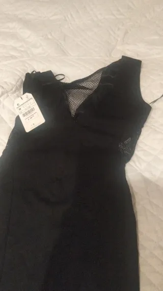 Vestido negro licra con detalles de malla
