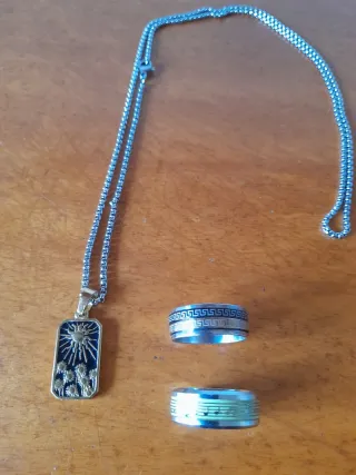 Conjunto 2 Anillos y Colgante Sol