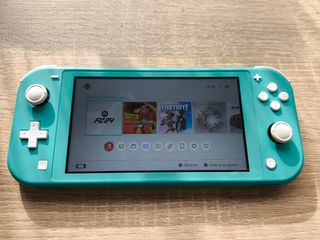 Nintendo Switch Lite + FC 24 + Funda