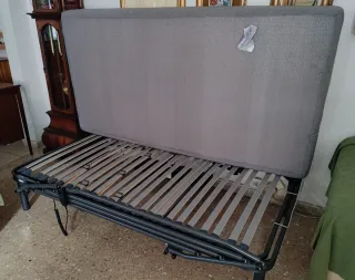 Cama articulada con barandillas