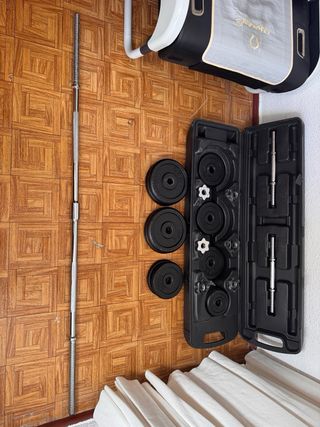 Maleta de pesas con barras y discos