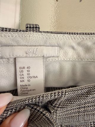 Vaqueros pitillo H&M cuadros gris T.40