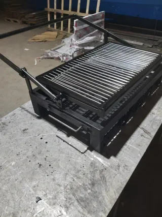 Parrilla giratoria de carbón metálica