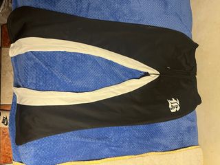 Pantalón chándal campana negro y blanco