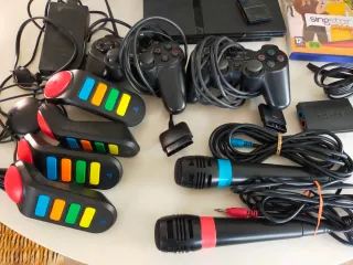 Consola PS2 + Volante, Micros, Buzz, Juegos.