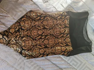 Body negro y dorado con transparencias