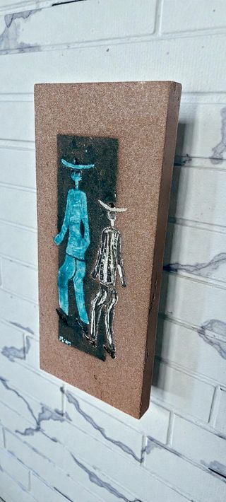 Placchetta polimaterica da parete