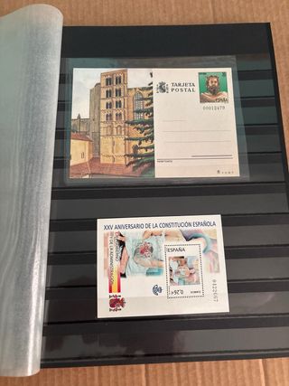 Álbum sellos y tarjetas postales