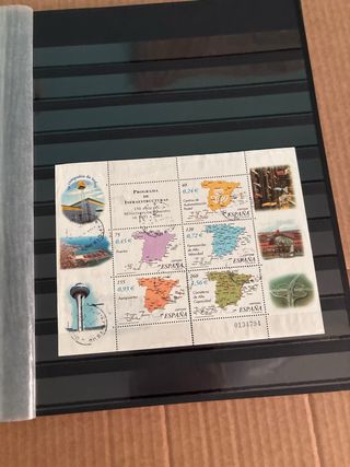 Álbum sellos y tarjetas postales