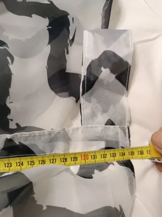 Dos Cortinas tejido fluido.
