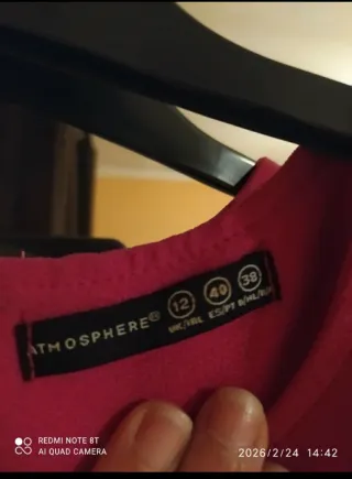 Top sin mangas con volante y cremallera