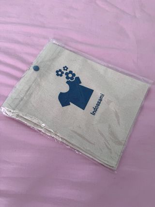 Sacchetto per vestiti con bottoncino