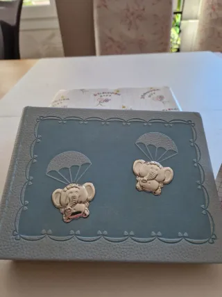 Álbum de fotos azul con elefantes