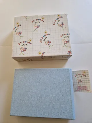 Álbum de fotos azul con elefantes