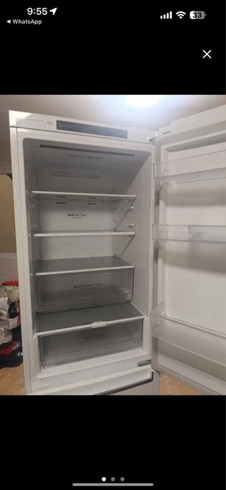 Nevera blanca con golpe